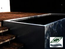 Terrassenabschluss mit verzinktem Becken Terrassenabschluss mit verzinktem Becken