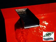 Metallblock mit Wasserschütte